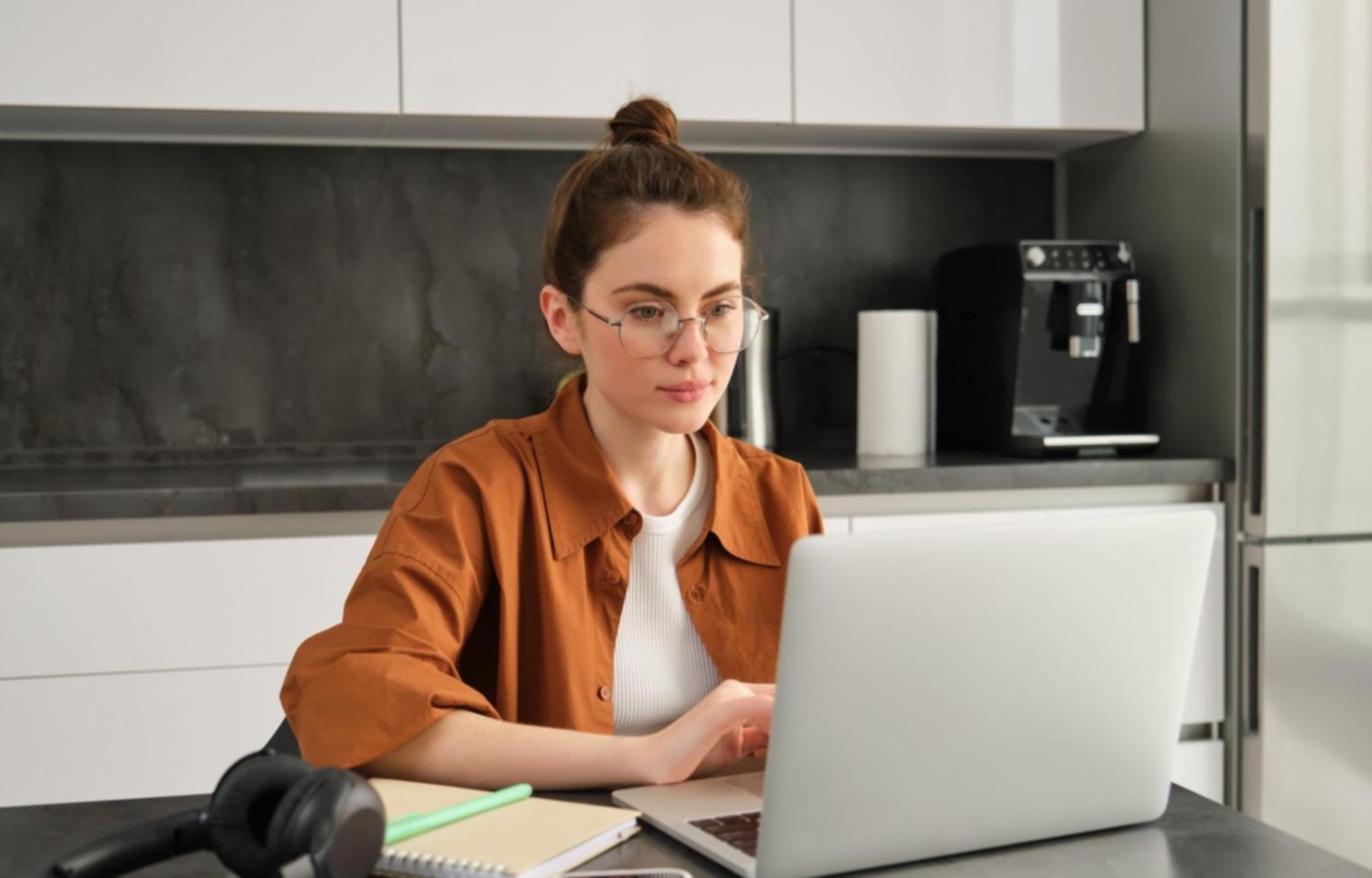Students collaborating on financial planning exercises in a modern learning environment